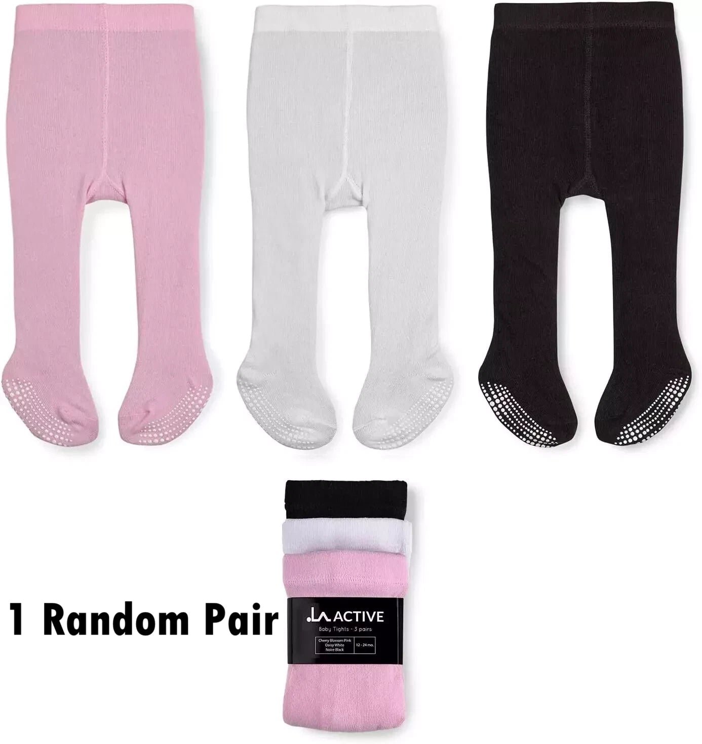Close-up of anti slip grips on baby tights feet area