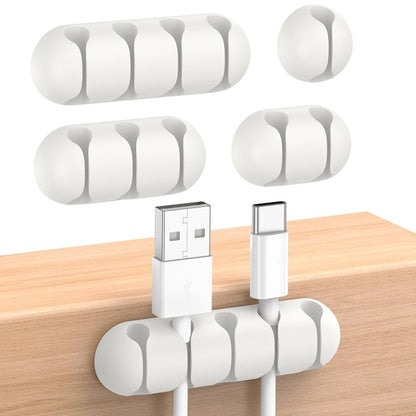Adhesive cable clips used in gaming setup for cable control