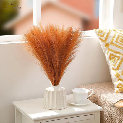 Artificial pampas grass in vase used for boho home decor styling
