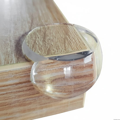 Baby corner protectors installed on table edges for safety
