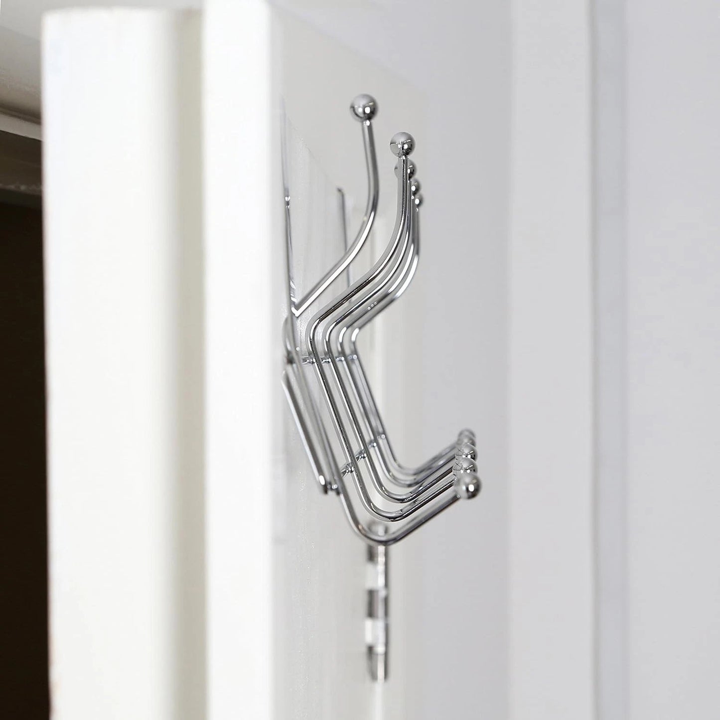 Bathroom over door hanger hooks used for daily towel storage
