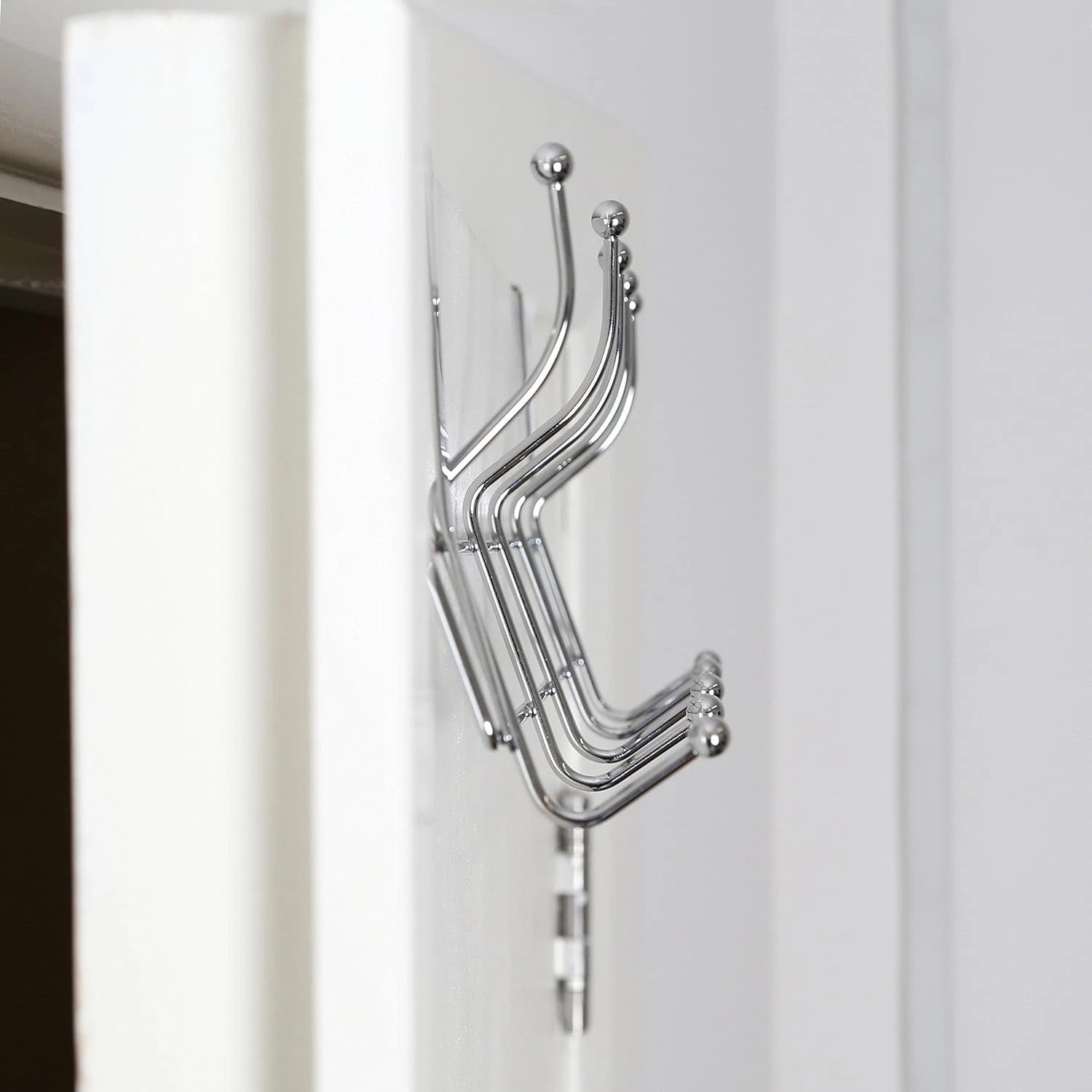 Bathroom over door hanger hooks used for daily towel storage