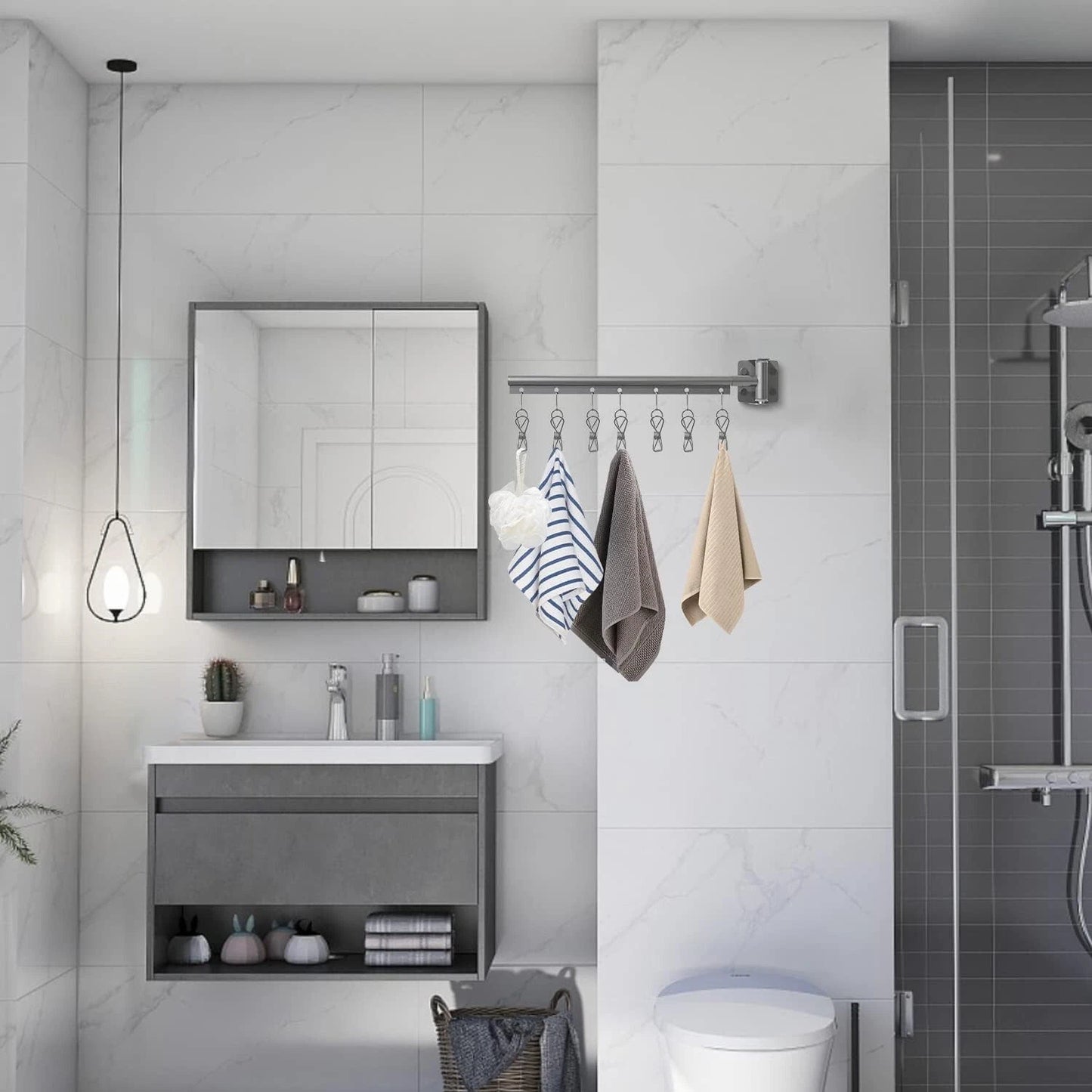 Wall mounted clothes drying rack used in bathroom setting