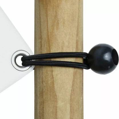 Canopy being secured using bungee ball cords for stable hold