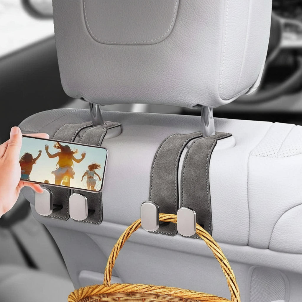 Car headrest hook holding coat neatly behind seat