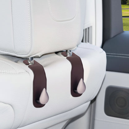 Car seat hook protecting bags from falling on dirty floor