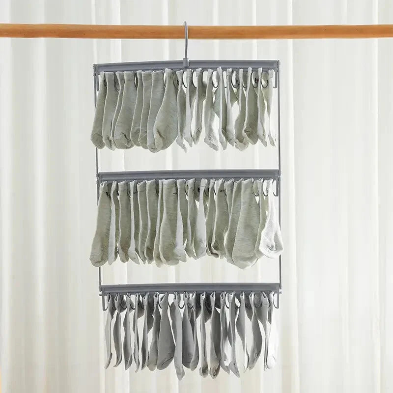 Compact trouser hanger for efficient wardrobe storage solution