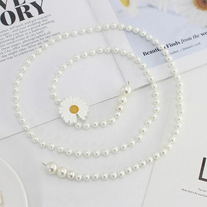 Elegant waist belt with pearls worn with dress outfit