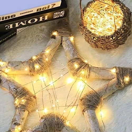 Flexible wire fairy lights shaped around decorative objects