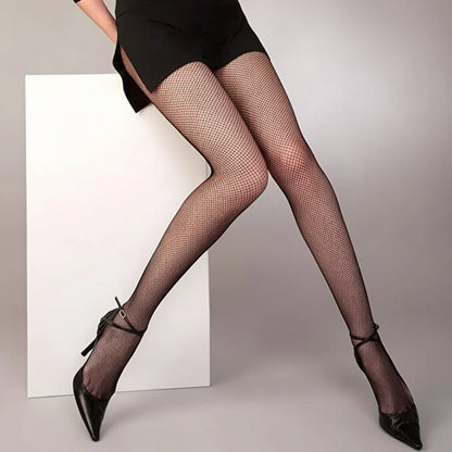 Stretch fit fishnet tights showing comfortable flexible design