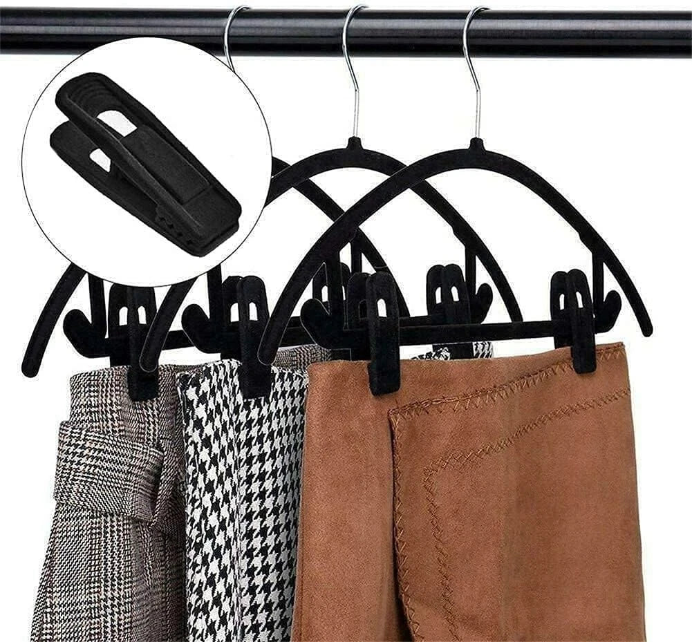 Flocked velvet trouser hangers showing strong grip clip design