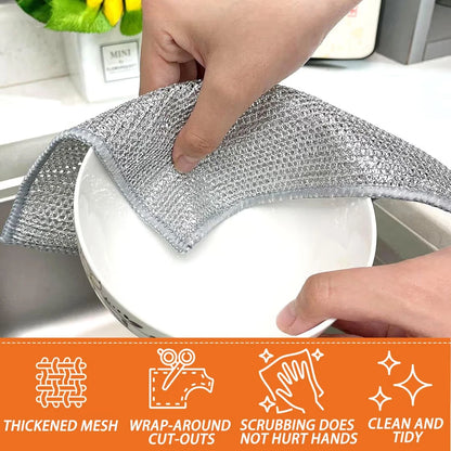 Grease removal dishwashing cloth used on kitchen utensils