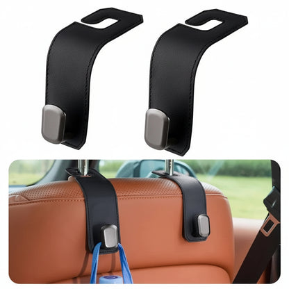 Close up of headrest hook holding handbag securely in car