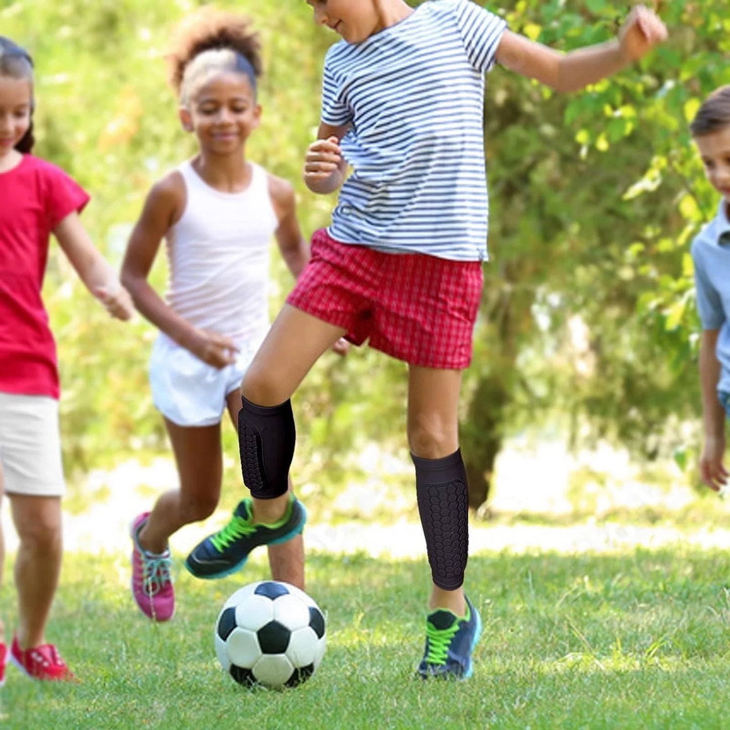 Honeycomb shin pads providing impact protection during football training
