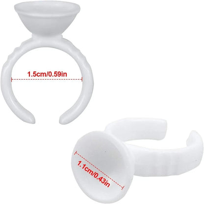 Lash adhesive finger ring used during eyelash application