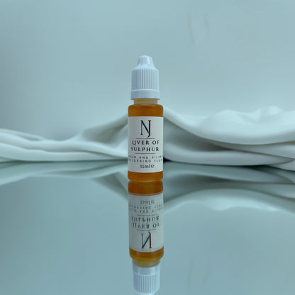 Liver of sulphur liquid used in metal art project application
