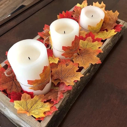 Flat lay of artificial maple leaves for event decoration styling