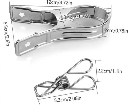 Metal clothes clips attached to washing line for drying clothes