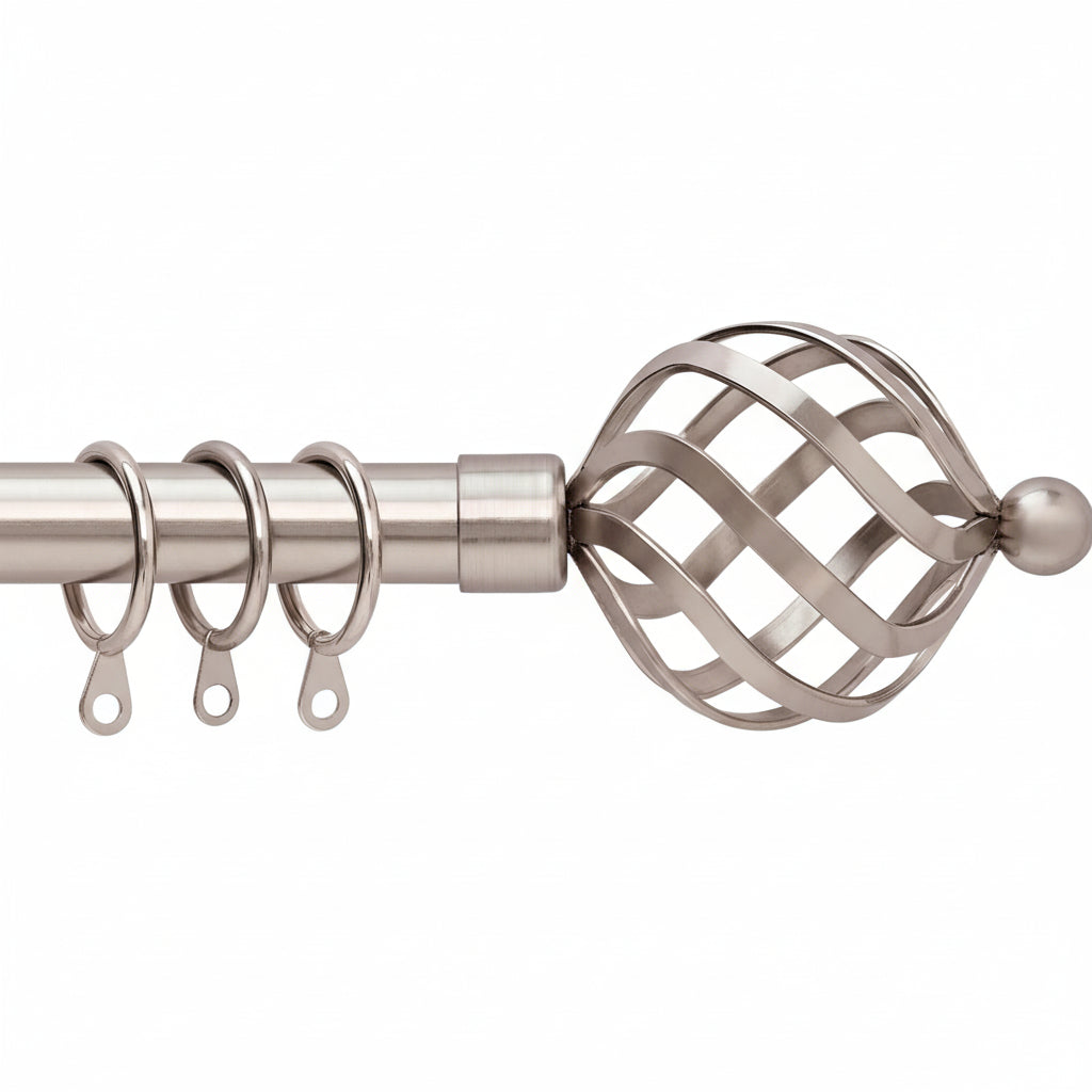 Close-up of metal curtain rod finial in twisted nickel finish