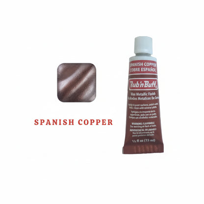 Metallic wax highlighting wood carved details and texture