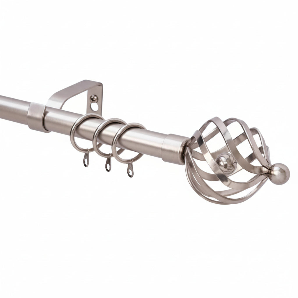 Side view of nickel curtain pole with decorative twisted finials