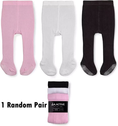 Close-up of anti slip grips on baby tights feet area