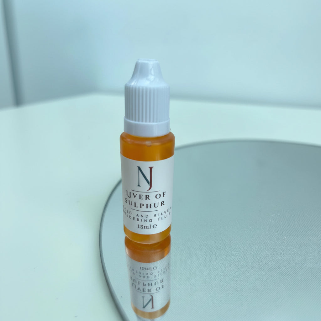 Patina solution highlighting fine details on metal design
