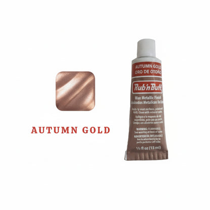 Applying Rub n Buff metallic wax on decorative surface close up