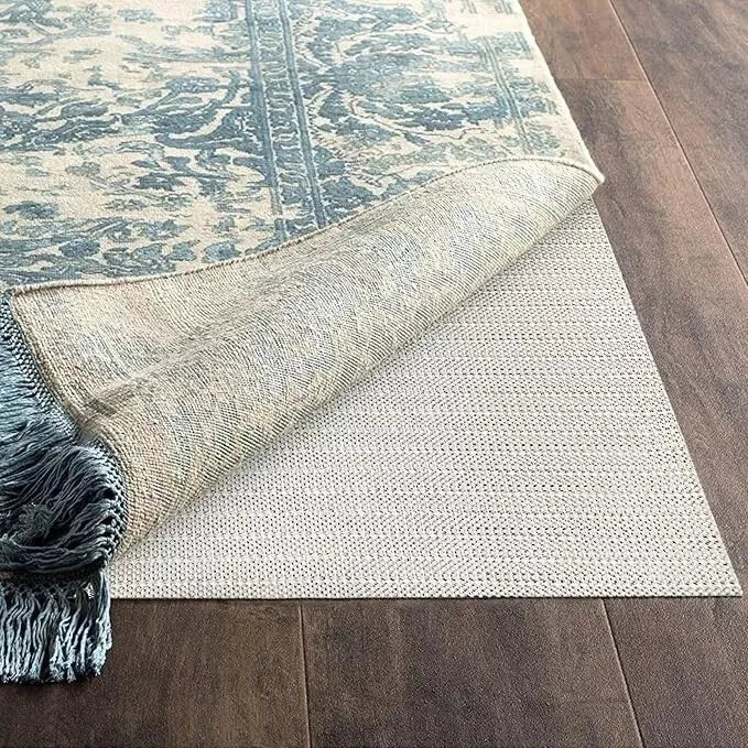 Ruggies grip pad corner holding rug firmly in place