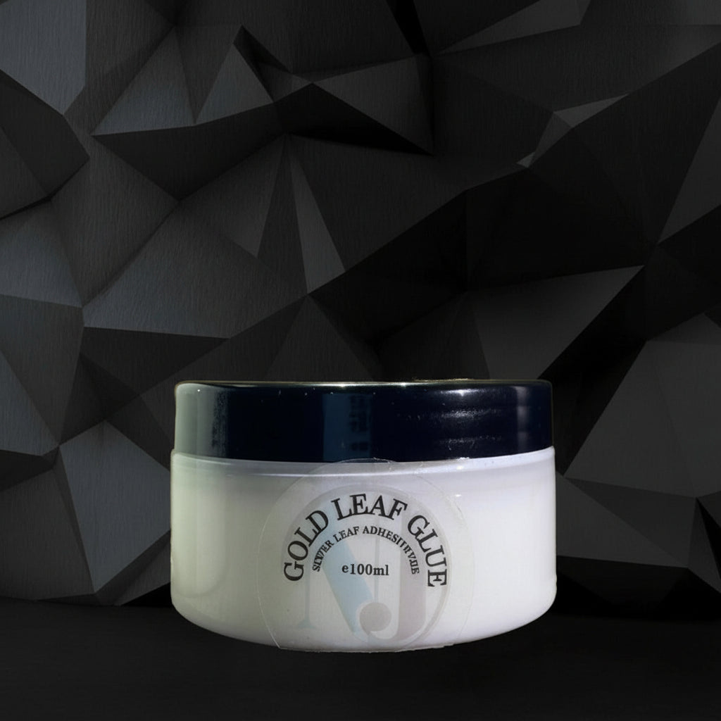 Water based adhesive for silver leaf application close up