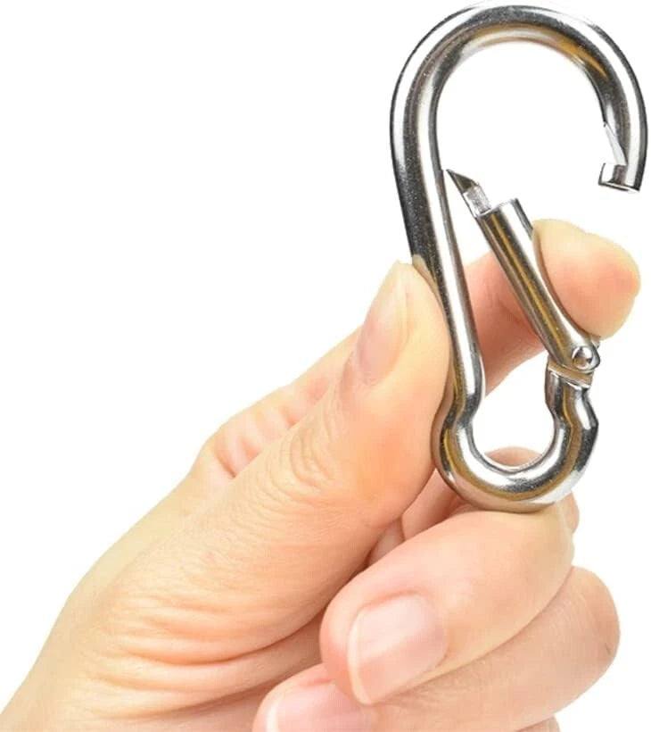 Strong carabiner clip attached to backpack for travel