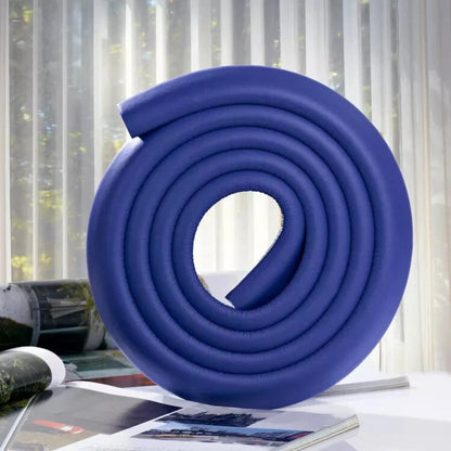 Table edge bumper protecting child from sharp corners