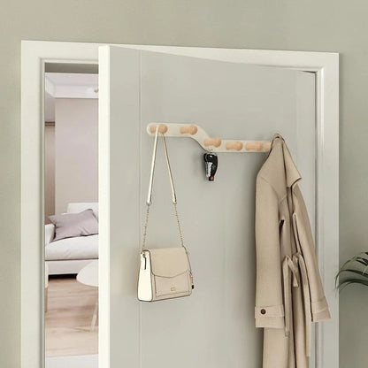 Wooden key holder rack close-up showing durable hook design